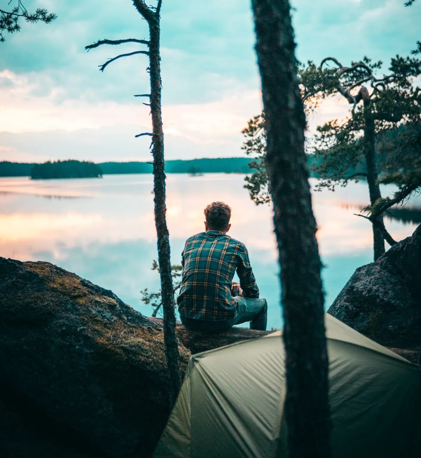 Person enjoying a moment of mindfulness outdoors